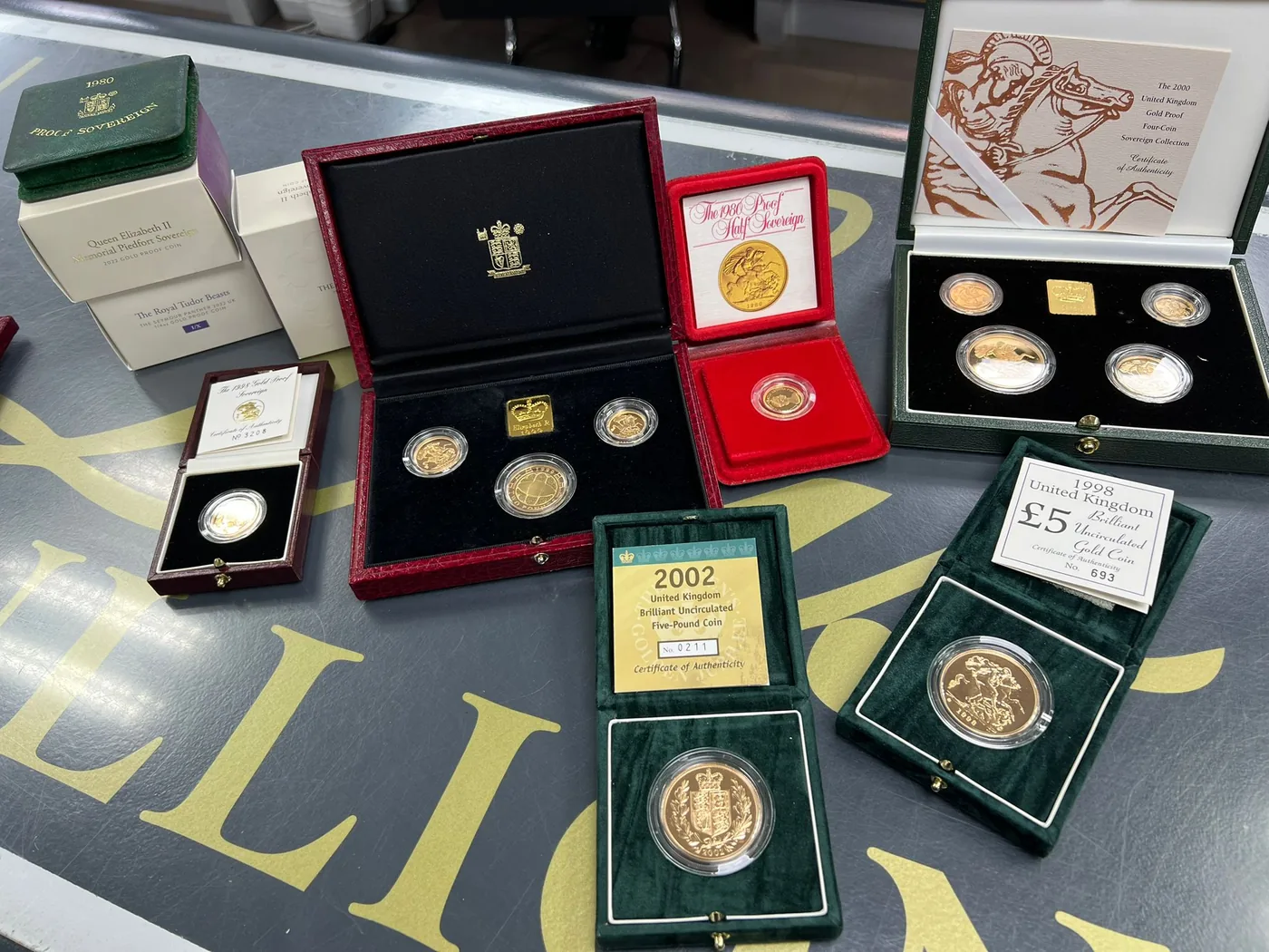 A complete collection of boxed gold and silver coins