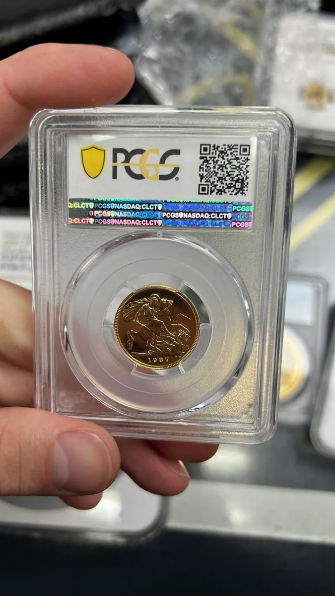 Reverse of a graded historic sovereign in its protective holder