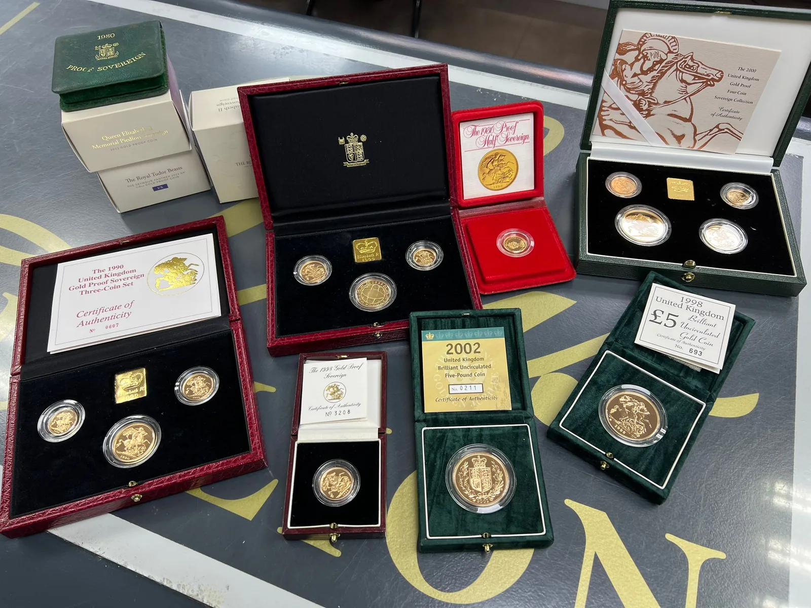 Proof coin sets with original presentation cases and certificates