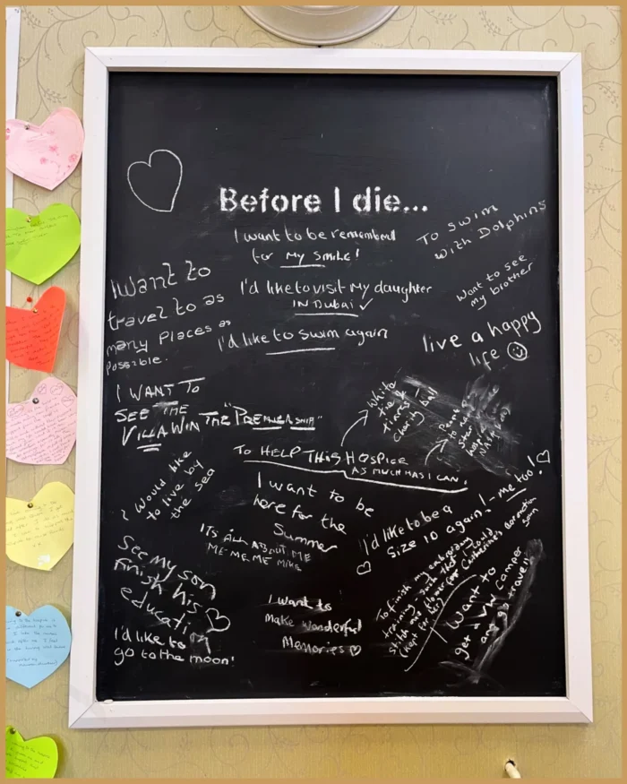 Before I die board filled with handwritten wishes at Birmingham Hospice