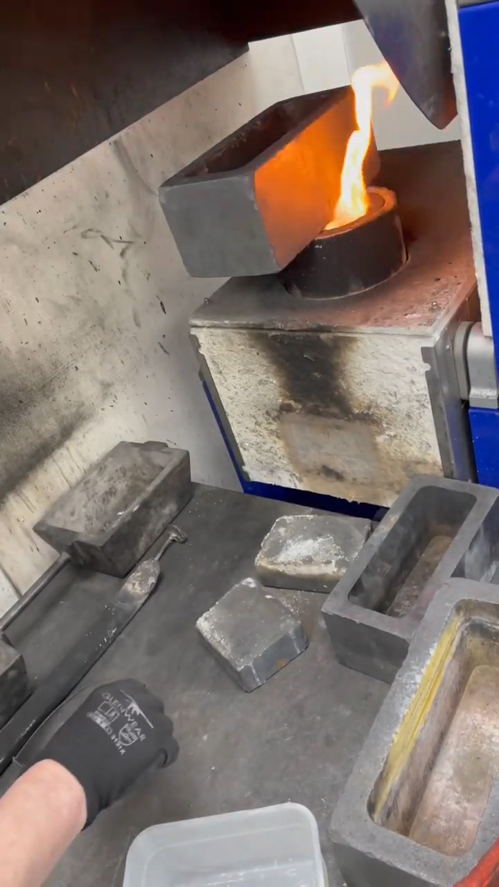 Placing the mould on top of the gold melting crucible